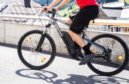 bigstock-Man-Riding-E-Bike-Bicycle-In-C-382719281-resized
